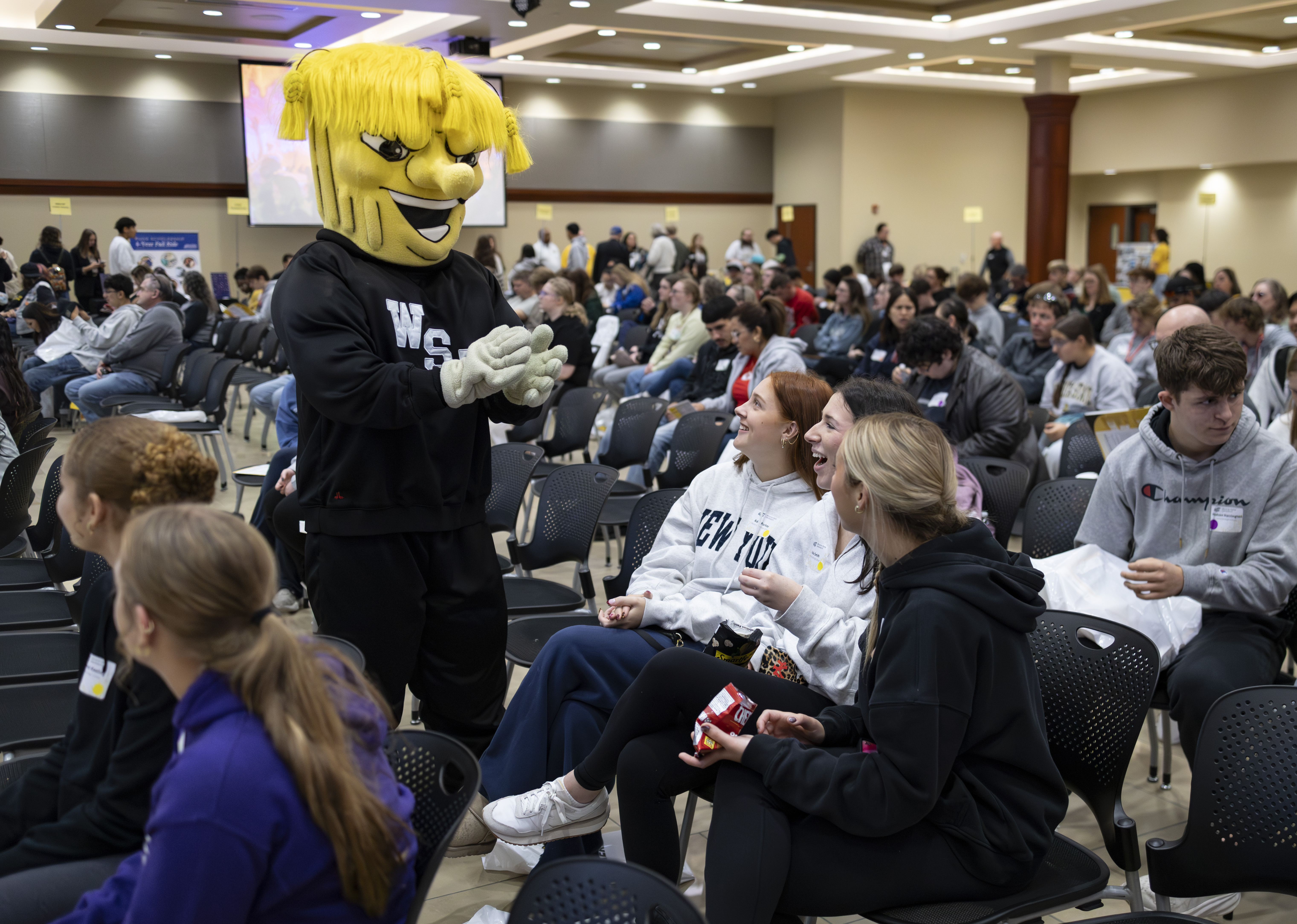 WuShock mingling with current students