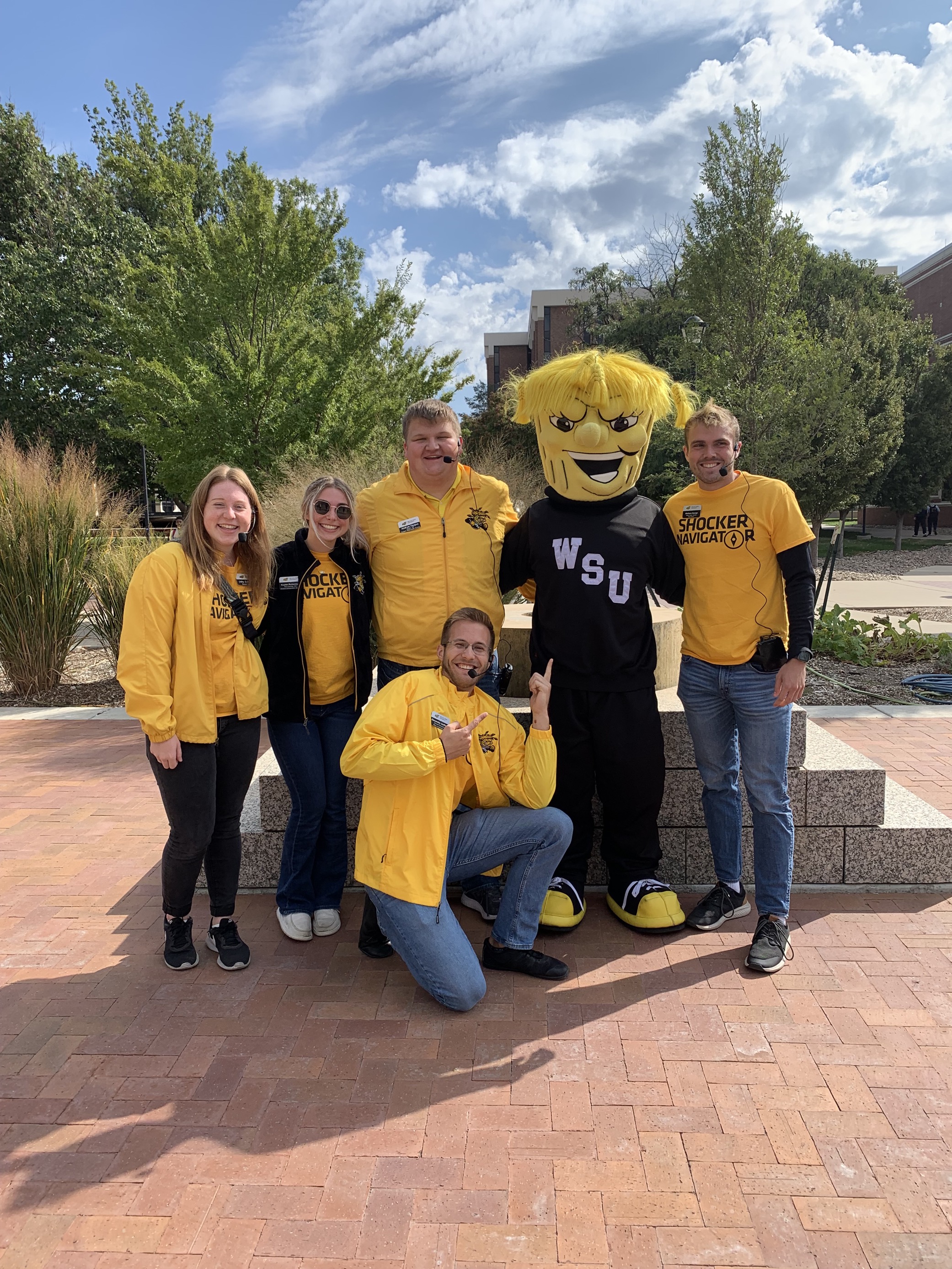 Group of students with WuShock before a tour