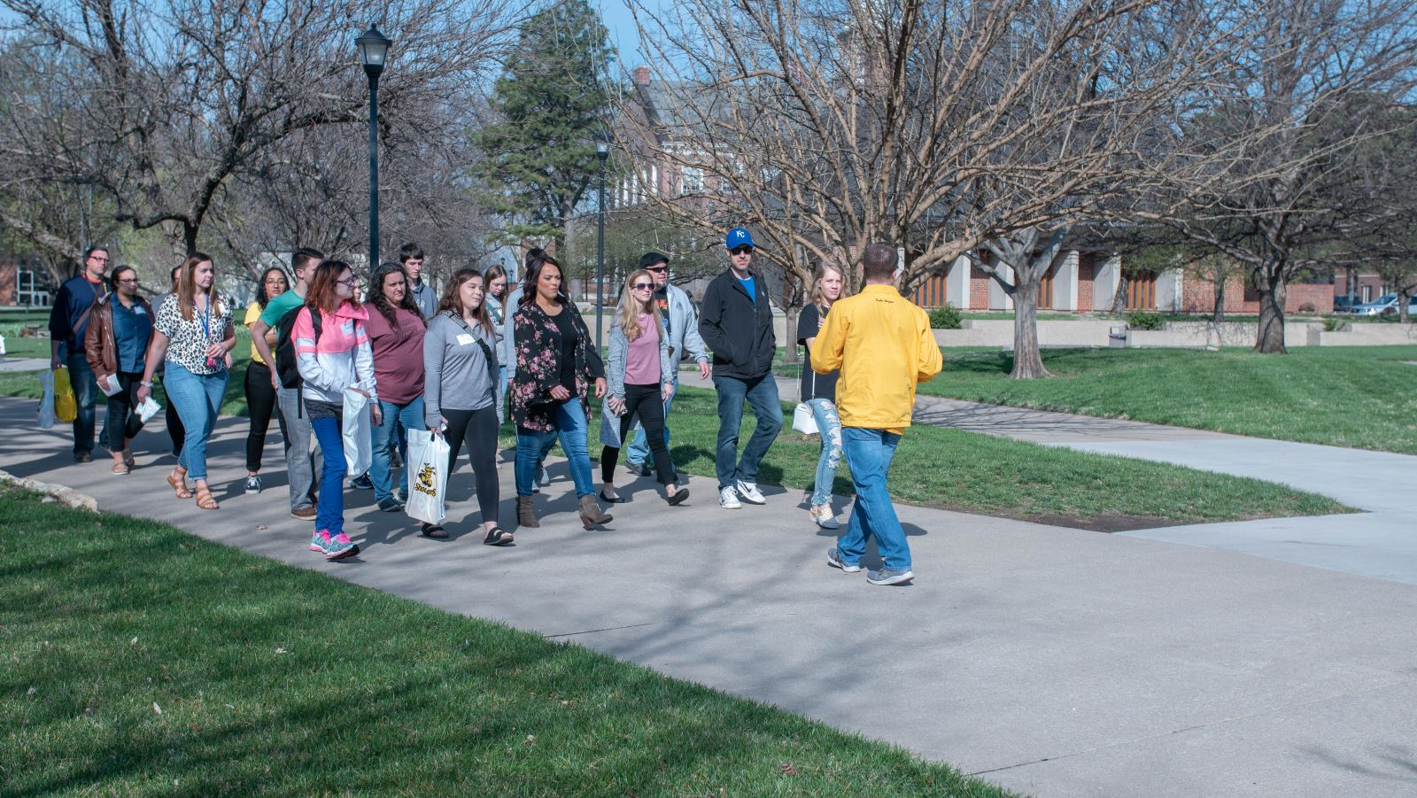 Tour group walking on campus