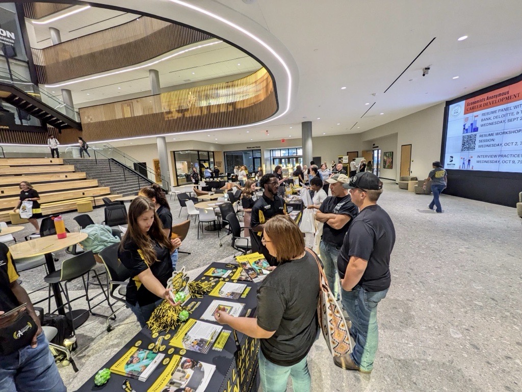 Guests checking in for the Discover Wichita State event