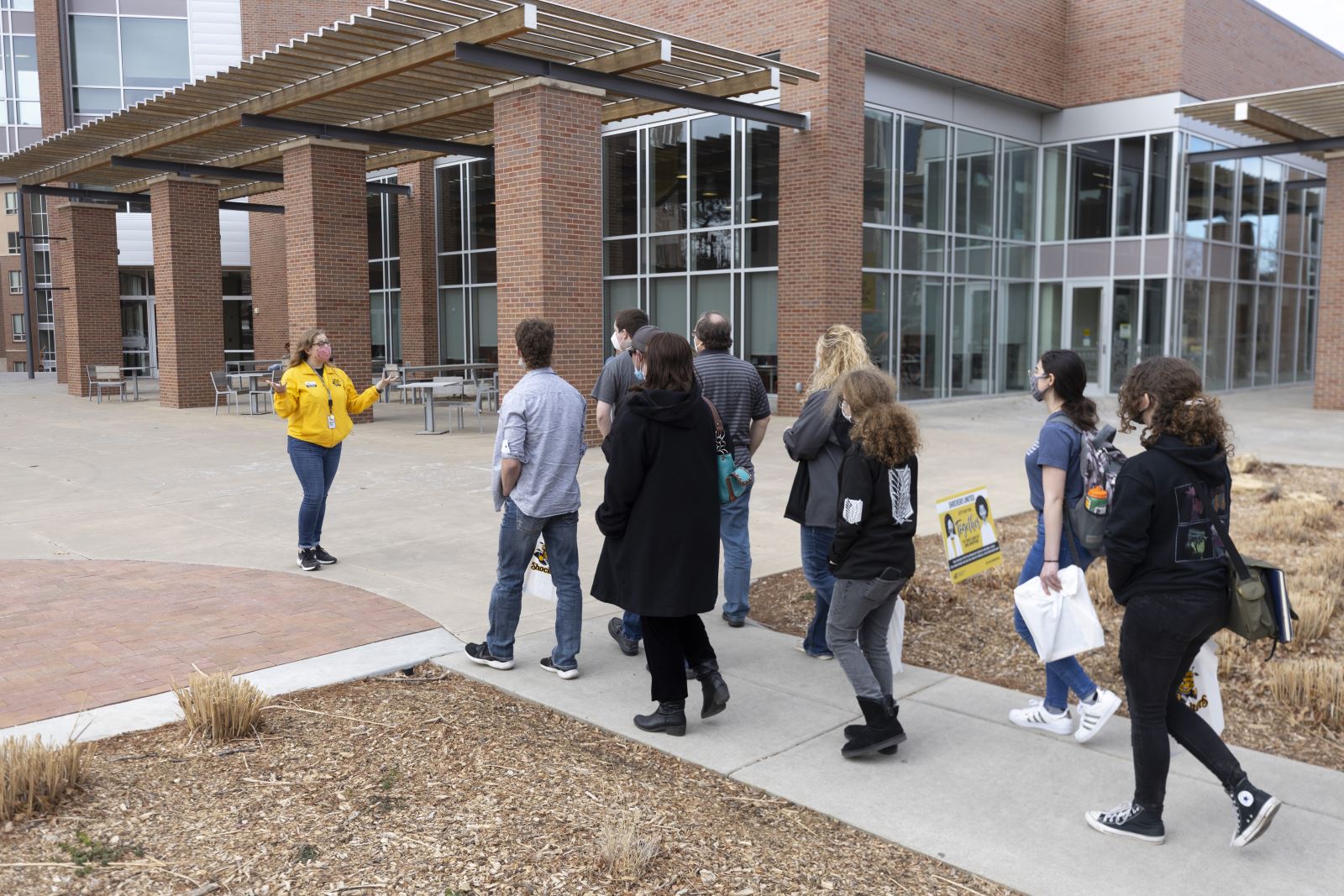 Student giving a group a campus tour